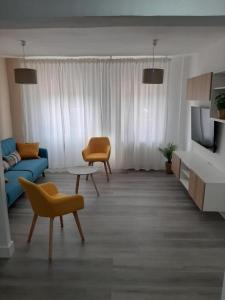 TV a/nebo společenská místnost v ubytování Reconquista 1 + 7 fotografií