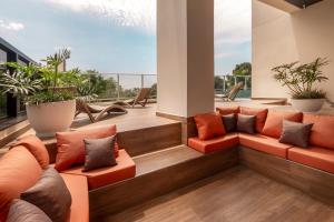 พื้นที่นั่งเล่นของ ÚNICO - Stay & Residences by AVA