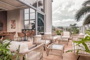 พื้นที่นั่งเล่นของ ÚNICO - Stay & Residences by AVA