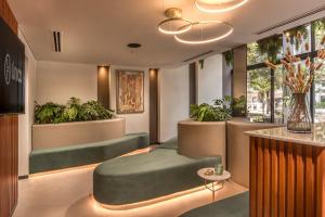 พื้นที่นั่งเล่นของ ÚNICO - Stay & Residences by AVA