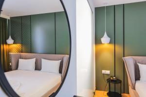 Postel nebo postele na pokoji v ubytování L'Amo del Mare Hotel