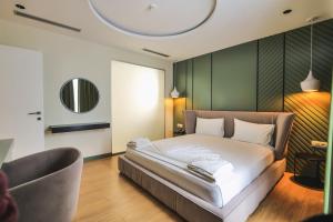 Postel nebo postele na pokoji v ubytování L'Amo del Mare Hotel