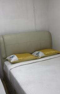 Postel nebo postele na pokoji v ubytování GG 98 Hotel + 1 fotografie