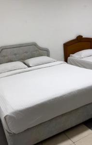 Postel nebo postele na pokoji v ubytování GG 98 Hotel