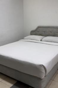 Postel nebo postele na pokoji v ubytování GG 98 Hotel