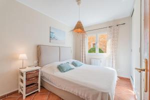 Postel nebo postele na pokoji v ubytování Casa Son Moja