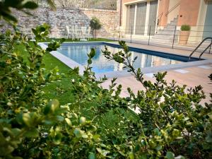 The swimming pool at or close to Villa Fontanelle Gardapartments