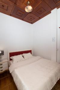  Кровать или кровати в номере Бизнес-Апартаменты Кутузовский 35 