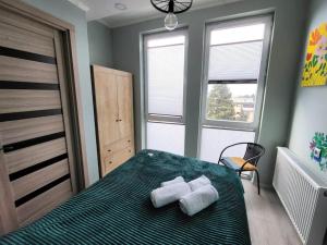 Кровать или кровати в номере BlueVibe Apartment