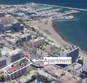 an aerial view of a city with a beach at Luxury Rental Benalmadena - 550 m2 Penthouse - Jacuzzi, Golf & Beach in Benalmádena +67 photos
