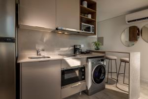 ครัวหรือมุมครัวของ ÚNICO - Stay & Residences by AVA