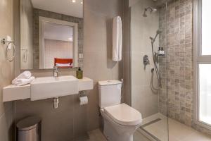 ห้องน้ำของ ÚNICO - Stay & Residences by AVA