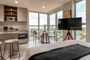 ครัวหรือมุมครัวของ ÚNICO - Stay & Residences by AVA