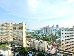 an aerial view of a city with tall buildings at New Urban Suite Majestics 3BR Homestay at Georgetown BY URBAN STAYCATION HENG LOD in Jelutong
