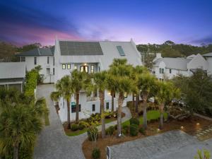 an image of a house with solar panels on it at License To Chill in Seagrove Beach