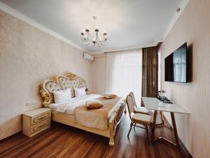 Voodi või voodid majutusasutuse Armenia Hotel toas
