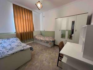 Ένα ή περισσότερα κρεβάτια σε δωμάτιο στο Yuxu coliving space