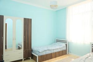 Ένα ή περισσότερα κρεβάτια σε δωμάτιο στο Yuxu coliving space