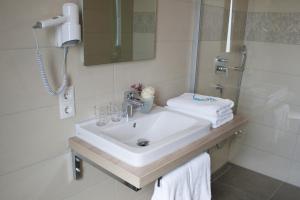 Ένα μπάνιο στο Hotel Claro Garni