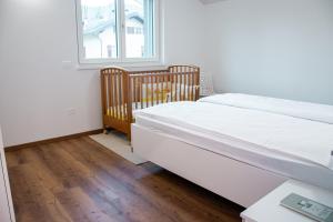 Posteľ alebo postele v izbe v ubytovaní Ivana-suite CIPAT 022104-AT-013433