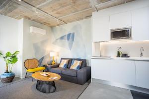 Kuchyň nebo kuchyňský kout v ubytování Apartamentos 7 dreams