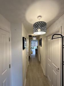 a hallway of a home with a hallwayngth at Birmingham Bliss Central 5-Bed Escape in Birmingham