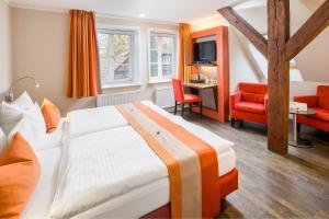 Postel nebo postele na pokoji v ubytování Hotel Am Kloster + 37 fotografií
