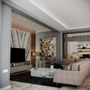 a living room with a couch and a tv at Special Apartment VIP HILTTON in Baku