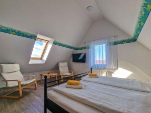 Televiisor ja/või meelelahutuskeskus majutusasutuses Alexandra