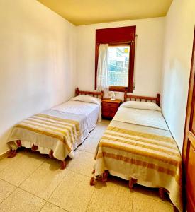 Postel nebo postele na pokoji v ubytování Casa Dos Pins - Pals