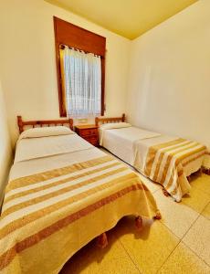 Postel nebo postele na pokoji v ubytování Casa Dos Pins - Pals