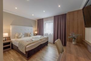 Voodi või voodid majutusasutuse Gasthof Ambachhof toas