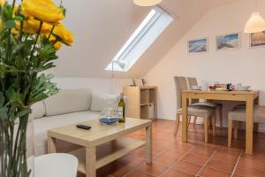 Posezení v ubytování Haus Harle 50202 Ferienwohnung Harle 2 + 6 fotografií