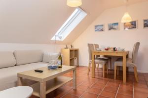 Posezení v ubytování Haus Harle 50202 Ferienwohnung Harle 2