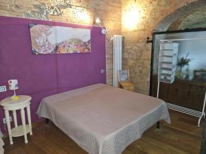 Postel nebo postele na pokoji v ubytování Bella Toscana