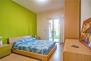Ένα ή περισσότερα κρεβάτια σε δωμάτιο στο Juice aparthotel - Diamante