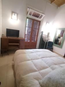 Postel nebo postele na pokoji v ubytování Casa Brandsen II