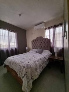 Postel nebo postele na pokoji v ubytování Casa Amistad