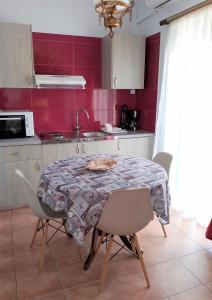Kuchyň nebo kuchyňský kout v ubytování LIGEIA HOME + 16 fotografií