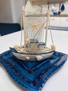 a model of a boat on top of a table at Apparthenope in Naples