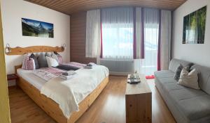 Postel nebo postele na pokoji v ubytování Haus Voithofer