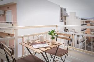 Un balcon sau o terasă la Mojo - Central Cozy Apartment