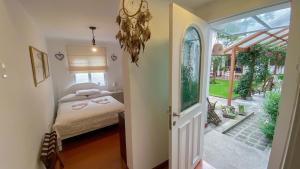 Postelja oz. postelje v sobi nastanitve Sakti Hostal B&B