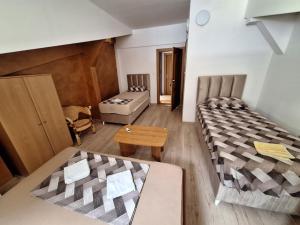 Postelja oz. postelje v sobi nastanitve Hostel Izvor