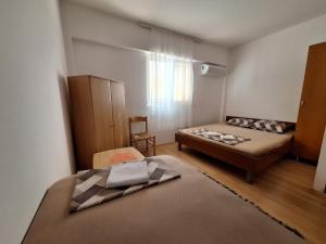Postelja oz. postelje v sobi nastanitve Hostel Izvor