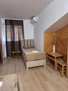 Postelja oz. postelje v sobi nastanitve Hostel Izvor