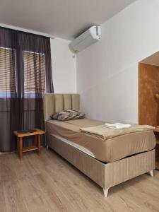 Postelja oz. postelje v sobi nastanitve Hostel Izvor