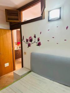 Postel nebo postele na pokoji v ubytování La casetta del Pescatore