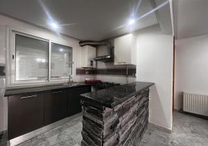 Kjøkken eller kjøkkenkrok på Apartment in Sousse​