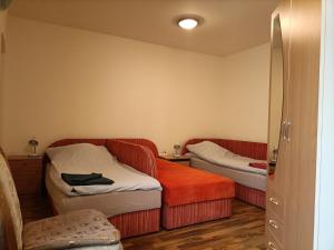 Posteľ alebo postele v izbe v ubytovaní START Apartmanok